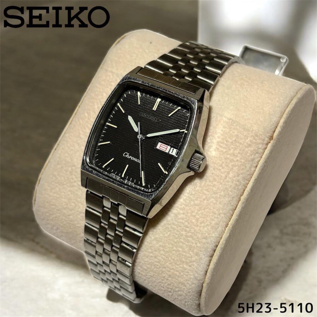 Second-hand - SEIKO Chronos 5H23-5110 Chronos Calendar Week Display Black: The battery is depleted. This is a highly practical quartz wristwatch with a textured black dial and a square case. Brand: SEIKO Model number: 5H23-5110 Dial color: Black Case shape: Square Material: 