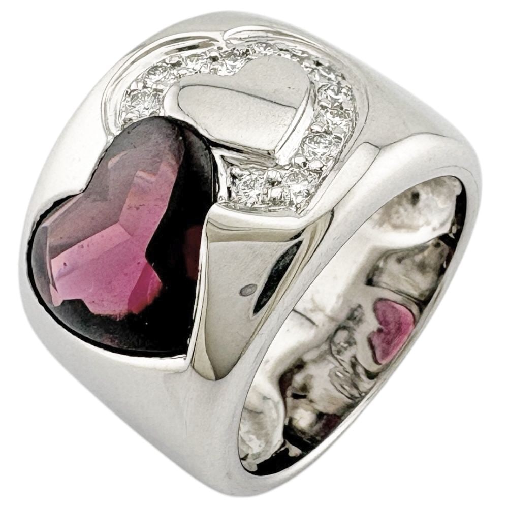 Second-hand - Ponte Vecchio ring, size 13, 18K white gold, with diamonds, for women.: Brand: Ponte Vecchio Target: Women Color: Silver Season: Suitable for all seasons Weight: Approximately 16.7 grams Origin: Japan Gemstones: Diamonds (approximately 0.23 carats) / Garnet Size: 13 Ring 
