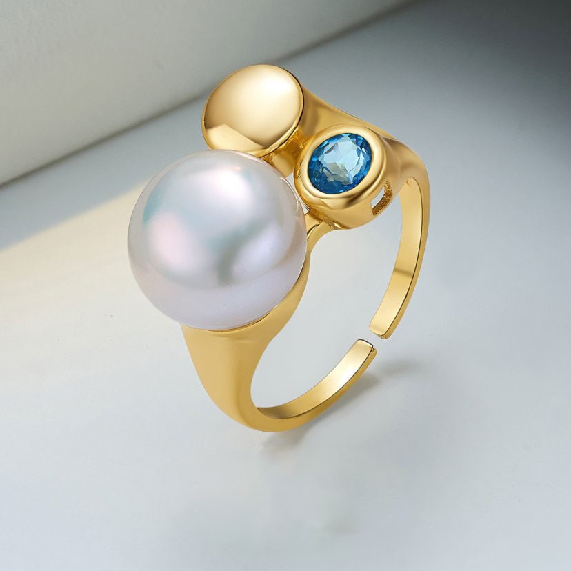 11-12mm Freshwater Pearl Ring, Blue Topaz 925 Silver Adjustable Ring: This elegant ring features a natural 11-12mm freshwater pearl paired with a sparkling blue topaz accent. Crafted from 925 sterling silver, the ring has a minimalist open design that allows easy size a