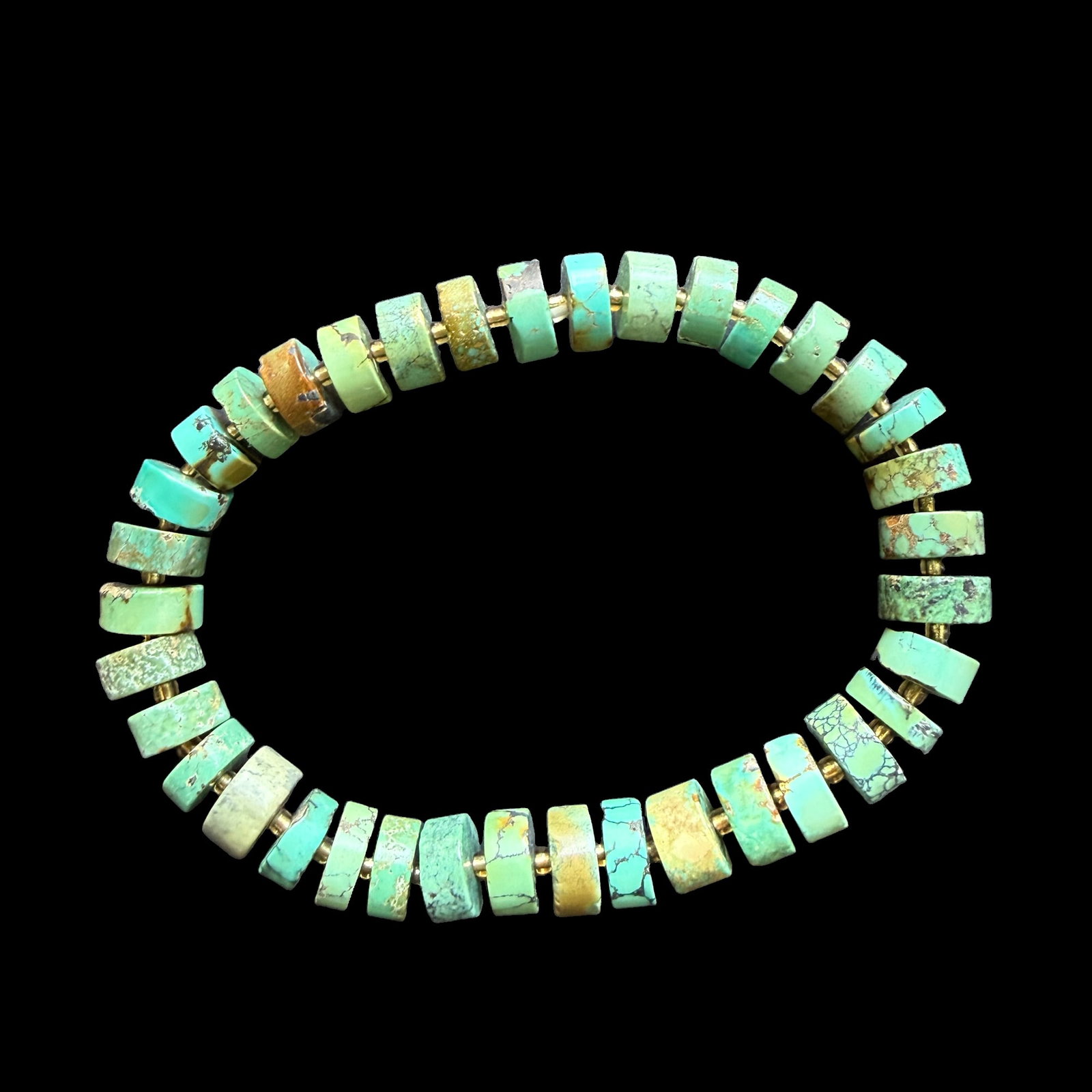 Natural Turquoise Heishi Beaded Bracelet, Approx. 8mm, 18g: Natural turquoise bracelet composed of heishi-style beads measuring approximately 8 mm. The bracelet weighs approximately 18 g and displays attractive blue-green tones with natural matrix patterns and