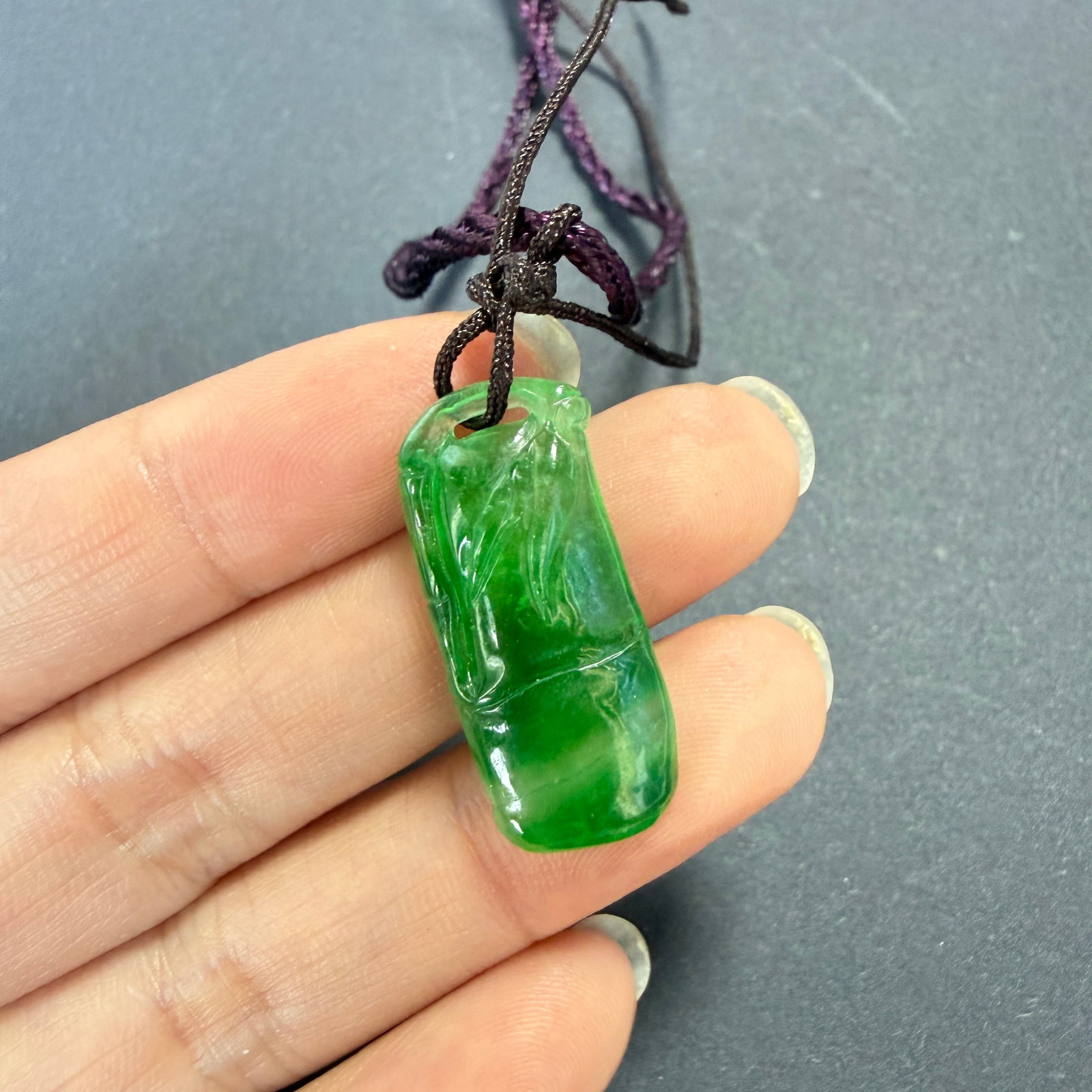 Imperial Green Jadeite Bamboo Pendant, Carved Jade Pendant, Approx. 2.5 cm, 4 g: Expertly carved from Imperial Green jadeite, this pendant features a classic bamboo design, admired for its elegant proportions and refined craftsmanship. The rich green color with natural tonal varia