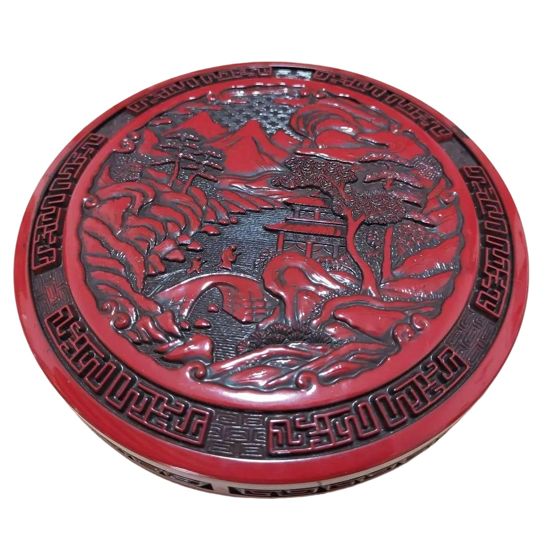 Carved Lacquerware, Layered Lacquer, Calligraphy Tools: This is a set of small calligraphy tools housed in a Tang Dynasty Chinese craft container. The container is characterized by carved lacquer technique (applying thick layers of cinnabar lacquer and the