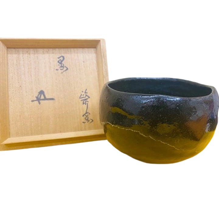 Black tea bowl, with an inscription by Master Honjitsu on the base.: Black tea bowl, inscribed with the signature of Master Honjitsu on the base.