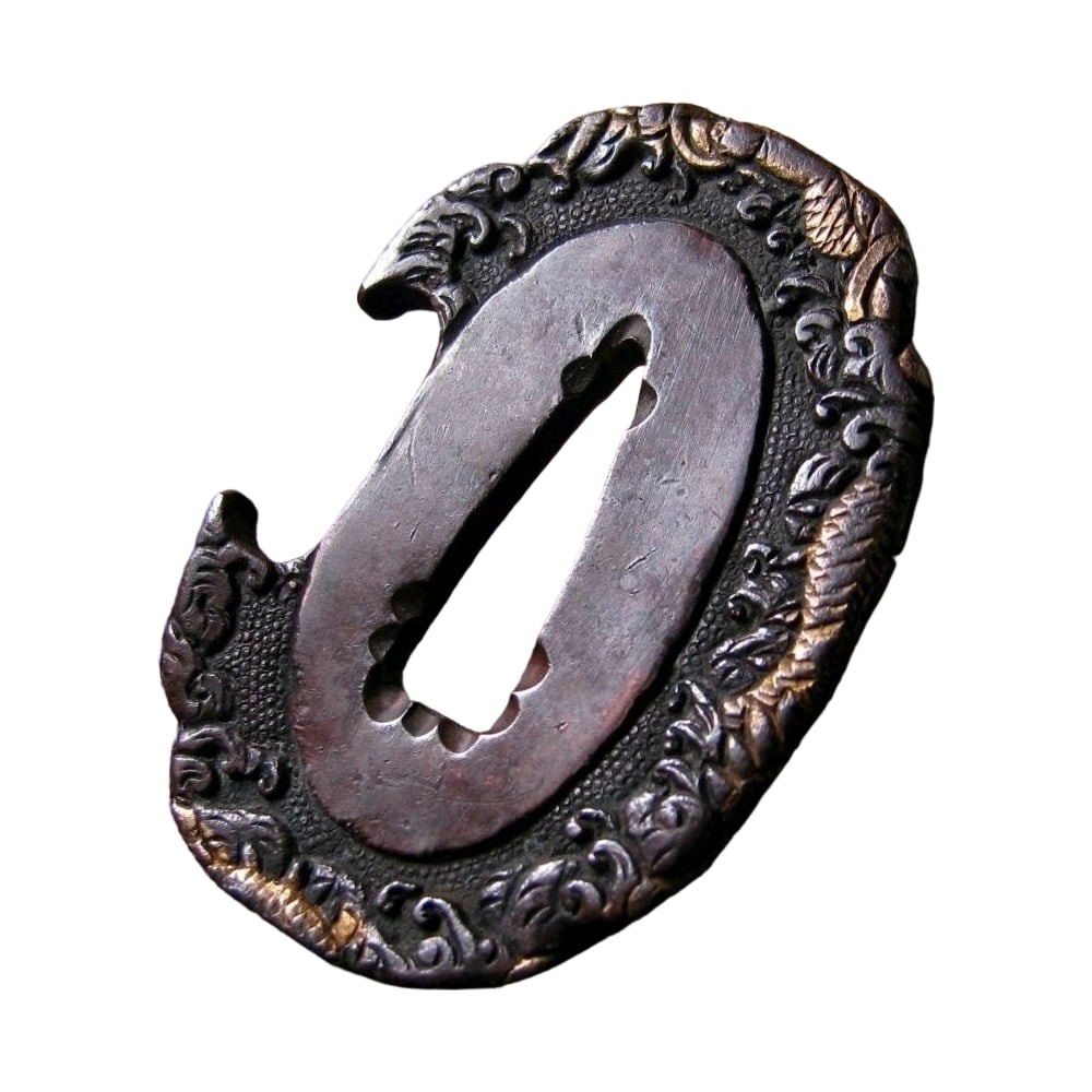 Shakudo Nanakoji Tanto Tsuba with Gilt Decoration, Edo Period / Tsuba: Period: Edo Period Dimensions: (Width) Approximately 5.15 cm x Approximately 3.68 cm (Thickness) Approximately 3.4-4.5 cm (Weight) Approximately 37.4 g Material: Shakudo Condition: Overall good condit