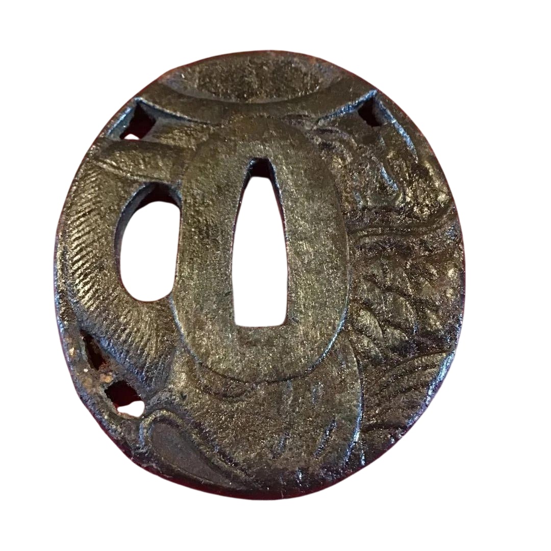 Iron Tsuba Sword Fitting with Dragon Motif, Openwork, Guaranteed from the Edo Period: This is an iron tsuba intricately openworked with a dragon motif, possessing a sense of weightiness. Material: Iron Motif: Dragon Technique: Openwork Dimensions (mm) Height: 58 Width: 48 Thickness: 5
