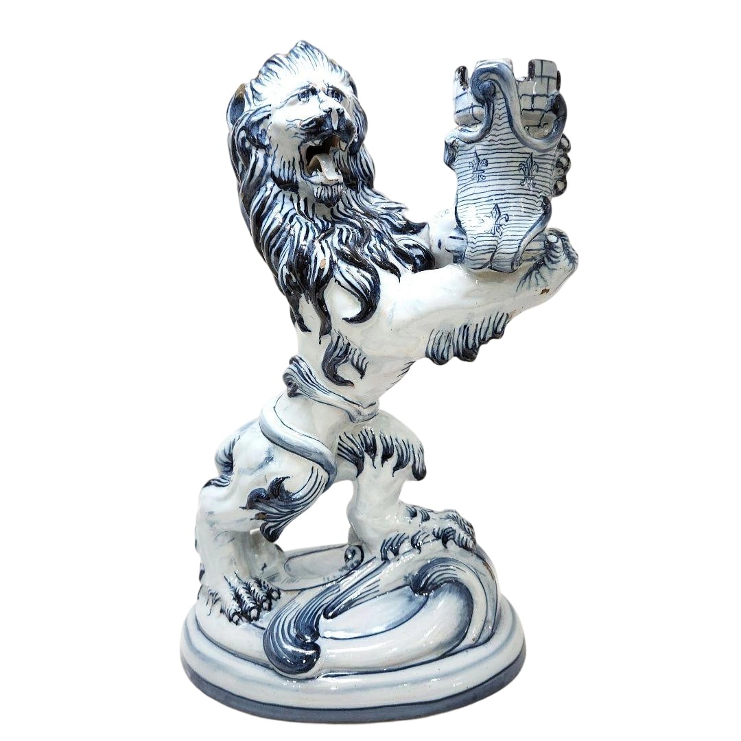 19th Century Emile Galle Soft-Paste Porcelain Lion Candlestick Height 33 cm: This is a 19th-century soft-paste ceramic lion candlestick created by Emile Galle. The head has kiln damage from firing, and there are minor chips and other small damages on the feet. Dimensions: