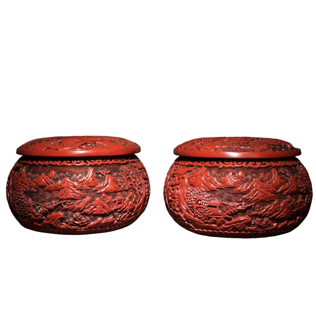 Carved Red Lacquer Go Jars: This pair of carved red lacquer Go jars showcases exquisite craftsmanship with a smooth lacquer surface and intricate patterns. The overall design is simple and elegant, reflecting the high skill of t