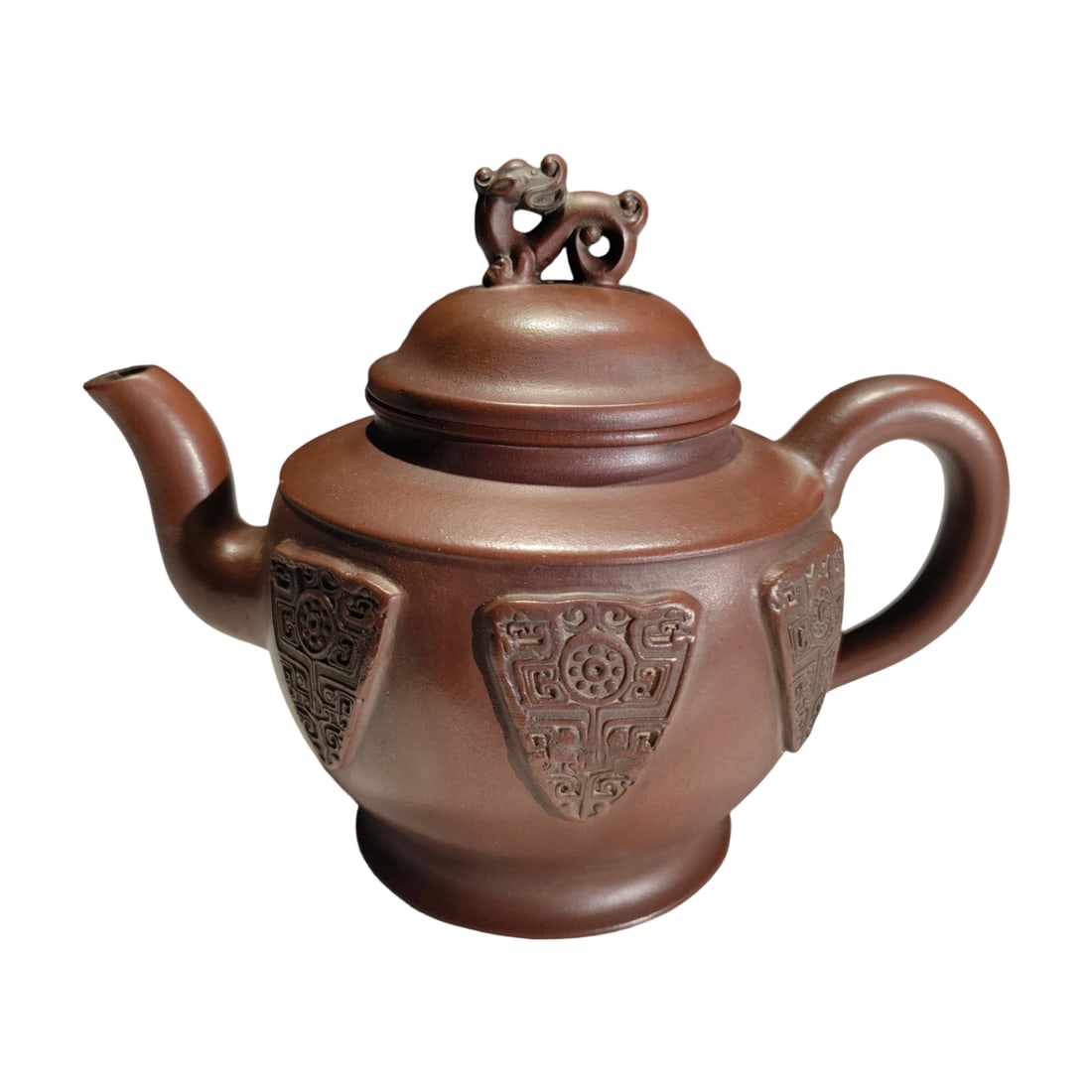 Late Ming to Early Qing Zisha Teapot with Relief 'Fortune in Sight': This Zisha teapot is a precious work from the late Ming to early Qing period, crafted by the renowned artisan Chen Ziqi. The teapot features a unique single-hole design with exquisite relief work symb