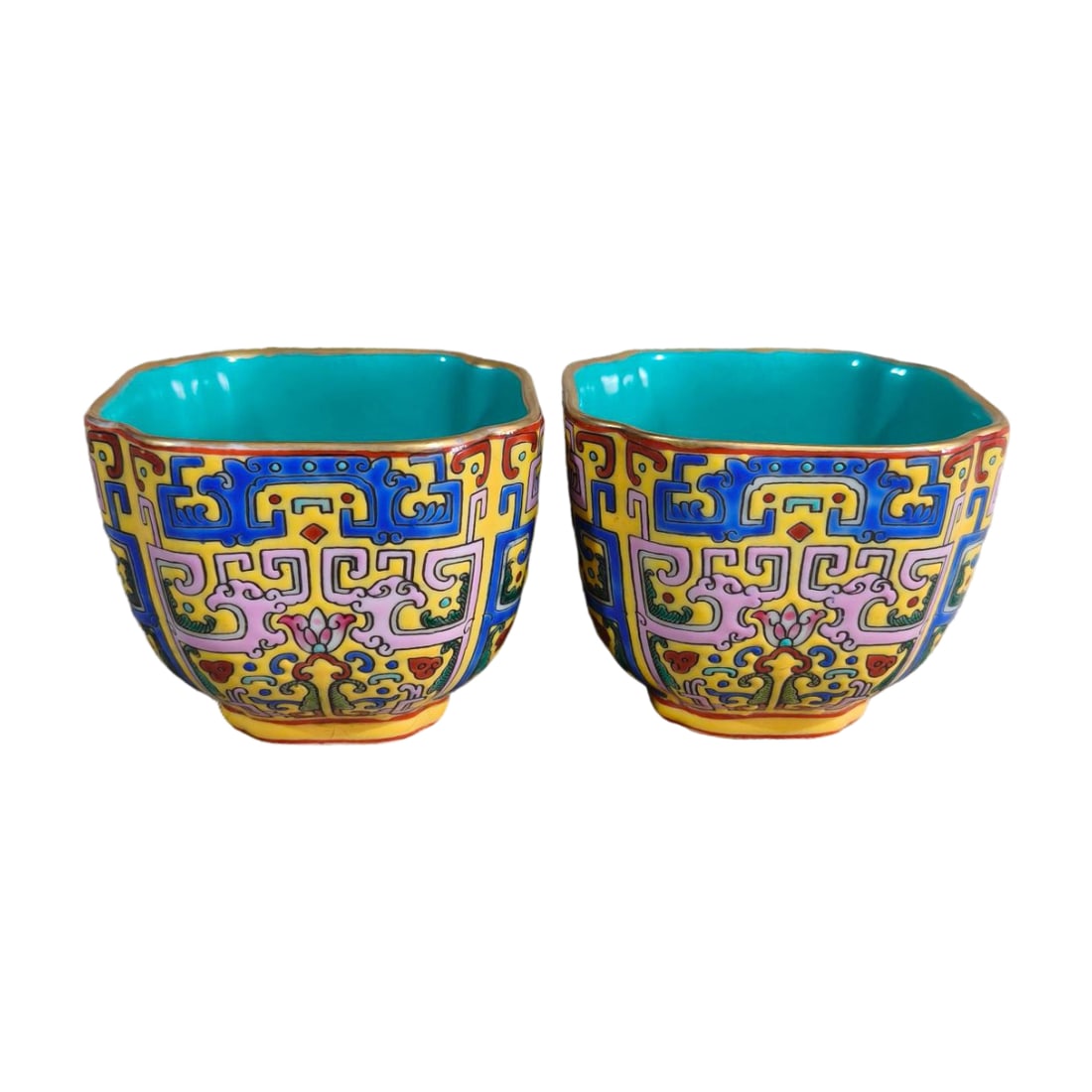 Qing Dynasty Qianlong Enamel Cup: This pair of enamel cups showcases the exquisite craftsmanship of the Qianlong period, with vibrant colors and intricate patterns, possessing high collectible value. Enamelware, as one of the imperial