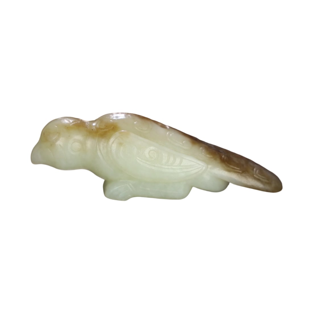 Hetian Jade Phoenix Bird: This Hetian jade phoenix bird features a fine and smooth texture with an aged patina, exuding an ancient charm. The detailed carving is exquisite, with flowing lines that demonstrate a high level of c