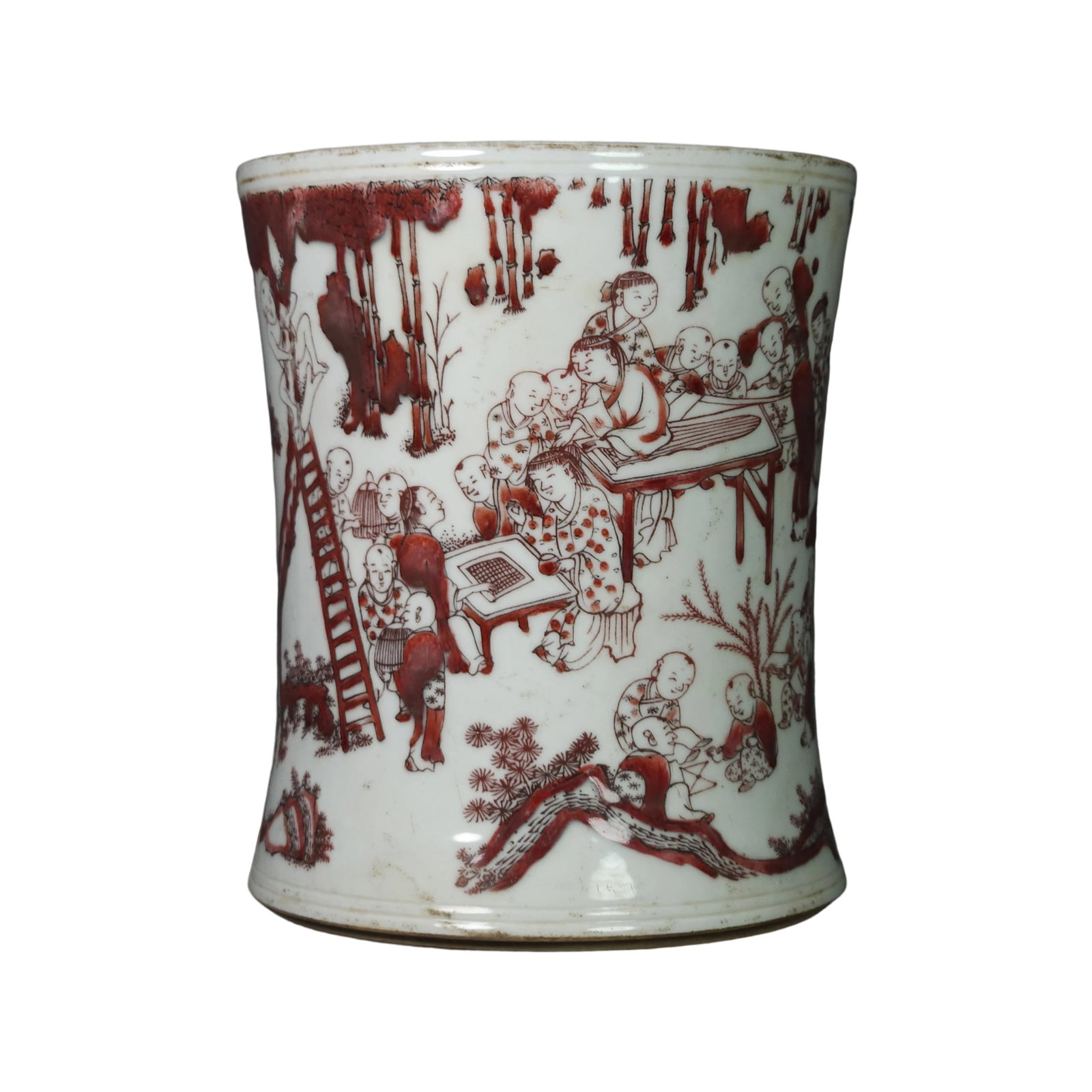 Qing Dynasty Underglaze Red Hundred Children Brush Pot: Qing Dynasty underglaze red brush pot with hundred children motif, featuring vibrant red hues and a lively depiction of children at play, symbolizing prosperity and good fortune. The brush pot has a