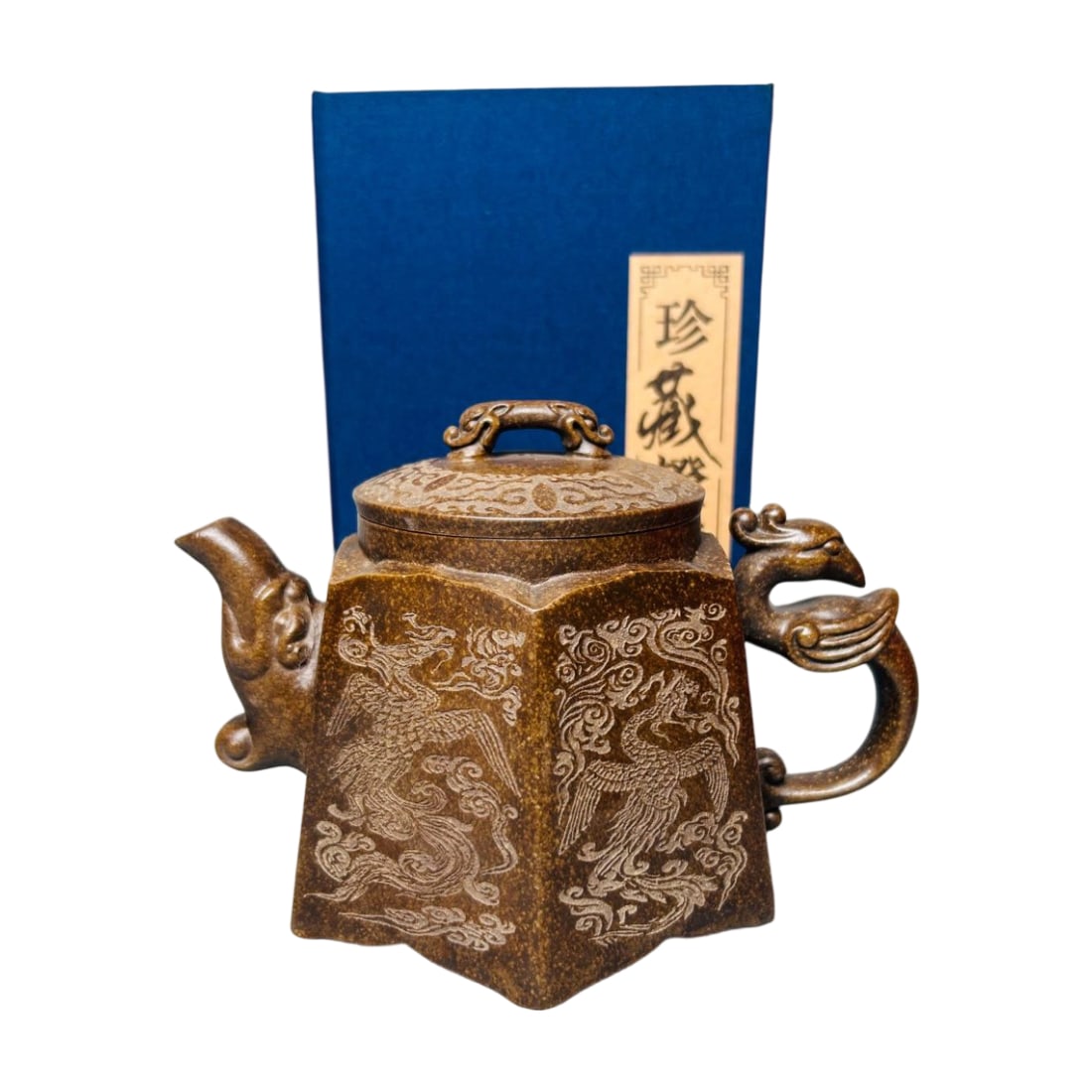 Yixing Zisha Dragon and Phoenix Teapot 360cc: This teapot is crafted by the renowned Yixing Zisha master Gu Jingzhou, using original mineral bronze sand. The texture is delicate and the color is ancient and simple. The dragon and phoenix motifs
