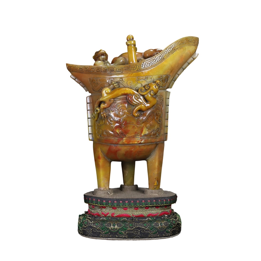 Shoushan Stone Three-legged Double-ring Beast Cup: This Shoushan stone three-legged double-ring beast cup is carved by a renowned artist, featuring exquisite craftsmanship with deep high relief technique. The appearance is unique and vivid. The stone
