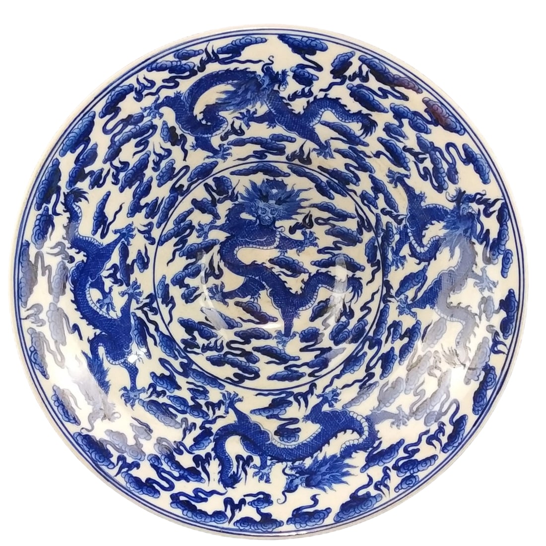 Kangxi Period Blue and White Hand-painted Dragon Pattern Douli Bowl: This Kangxi period blue and white hand-painted dragon pattern douli bowl exemplifies the exceptional craftsmanship and artistic beauty of Kangxi blue and white porcelain. The dragon pattern inside the