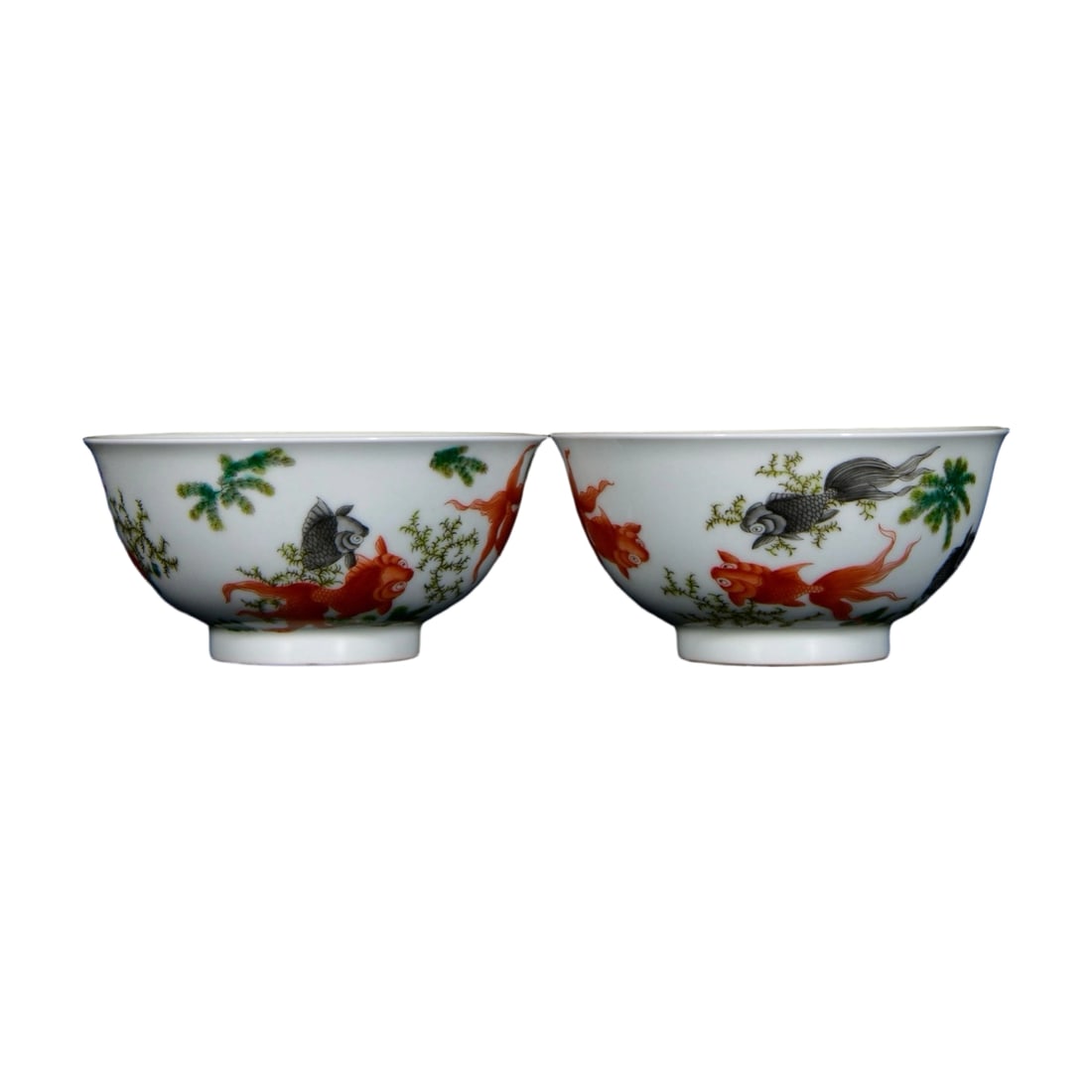 Pair of Qianlong Cloisonne Enamel 'Jade Abundance' Fish and Algae Pattern Bowls: A pair of Qianlong period cloisonne enamel 'Jade Abundance' fish and algae pattern bowls, showcasing the exquisite craftsmanship and luxurious aura of imperial porcelain. The bowls are vividly painted