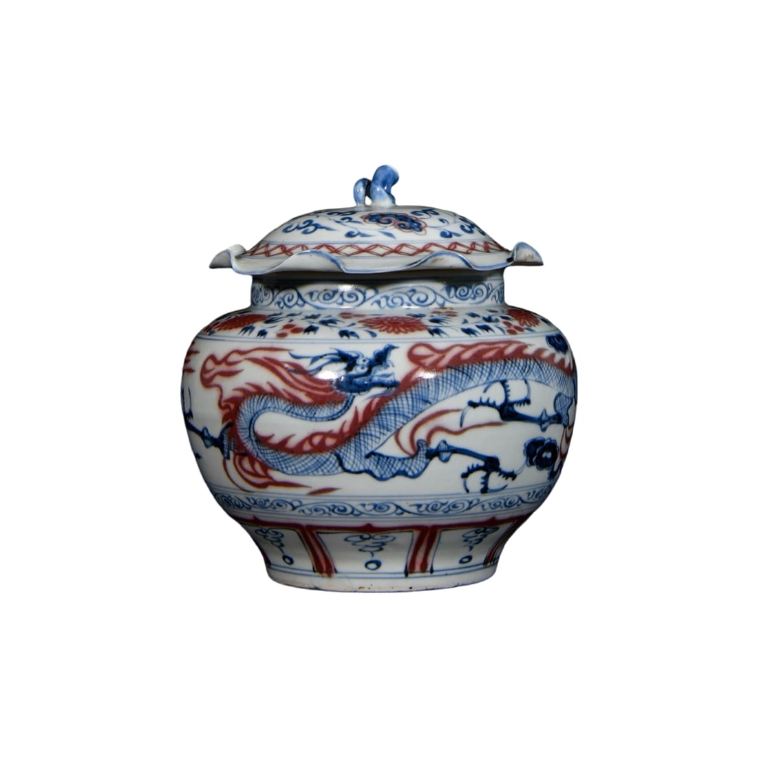 Yuan Dynasty Blue and White with Underglaze Red Dragon and Phoenix Leaf Jar: This Yuan Dynasty blue and white with underglaze red dragon and phoenix leaf jar exemplifies the pinnacle of Yuan ceramic artistry. The jar combines blue and white with underglaze red, featuring vivid