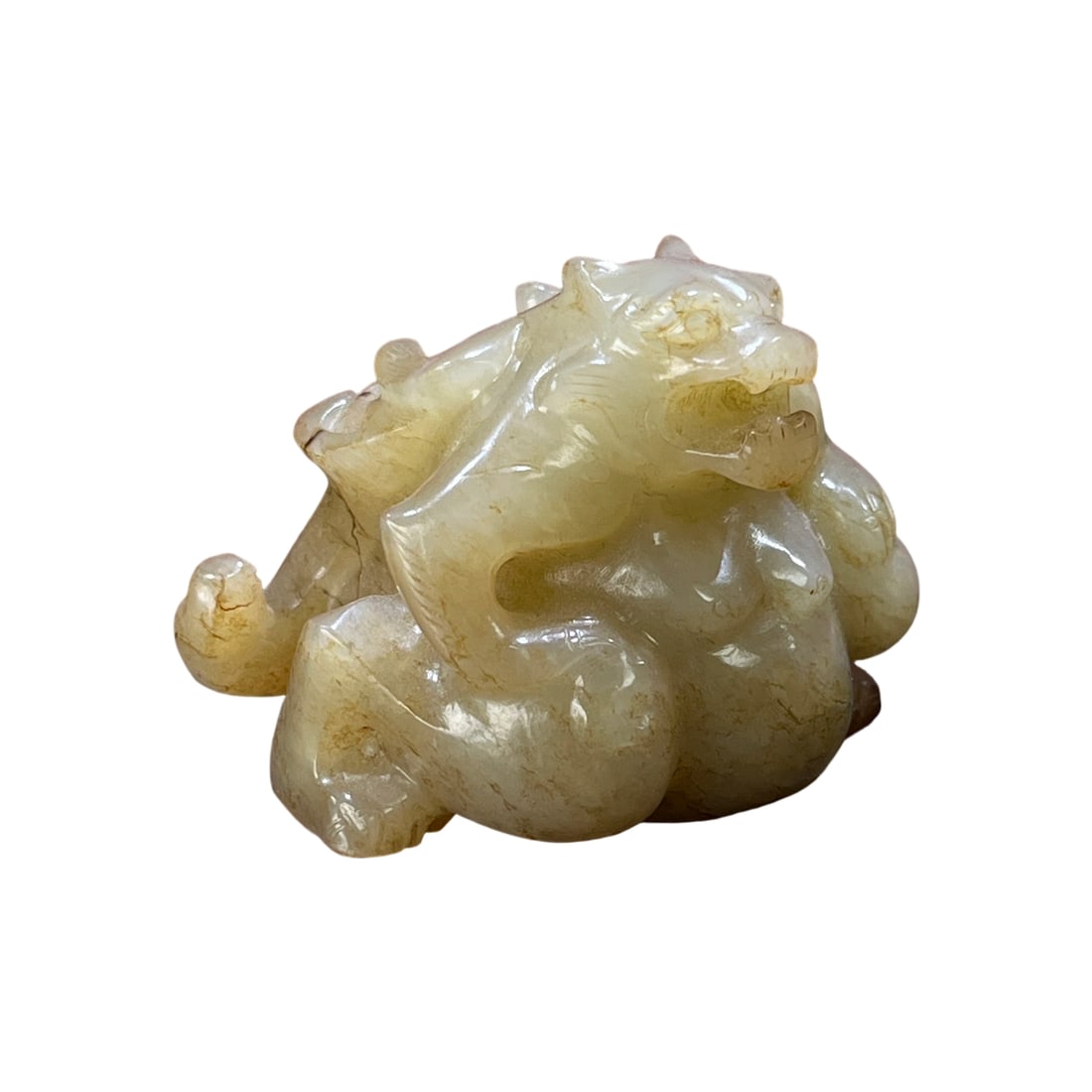 Natural Hetian Jade Auspicious Beast Ornament: This natural Hetian jade auspicious beast ornament features excellent material quality and superb luster, with the sugar jade color and earthy patina blending naturally. The jade's rich patina showcas