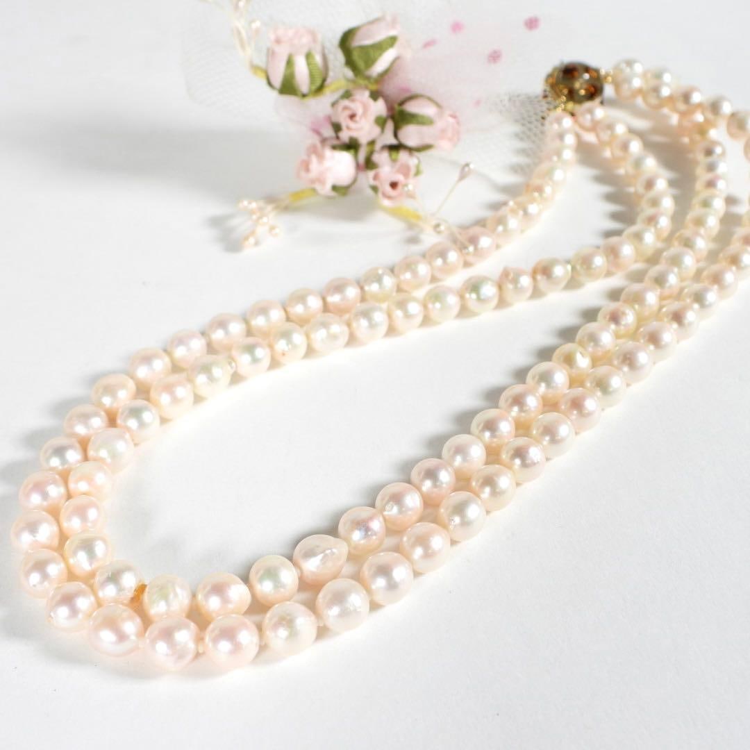 Double Strand Pearl Necklace: Dimensions approximately: Bead approximately 7.5 Weight approximately: 61.5g