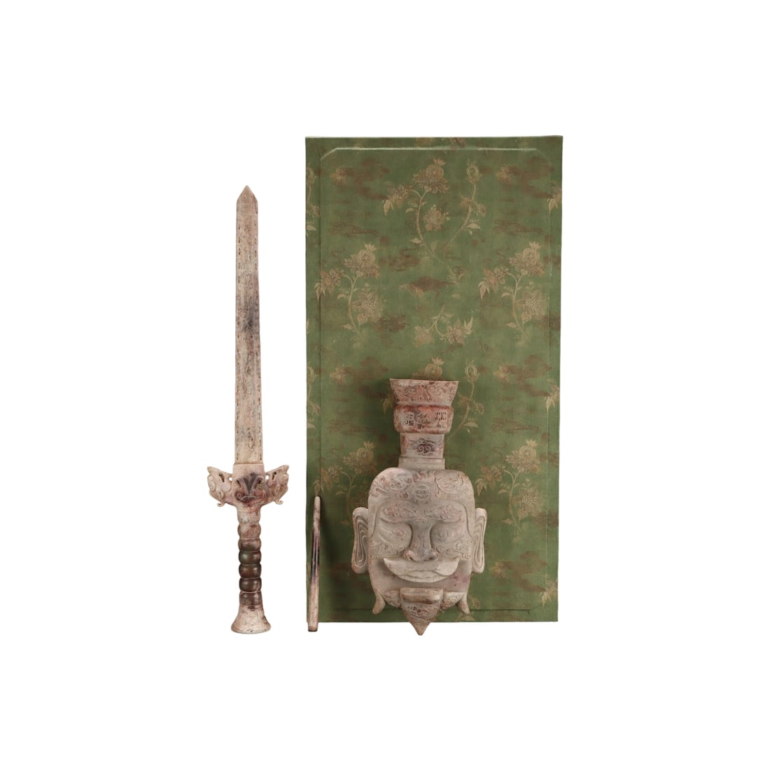 Old Collection Jade Sword: This jade sword features a long, suspended blade with an imposing presence. The jade is smooth and evenly colored, showcasing exquisite craftsmanship and the high skill of ancient artisans. It is well