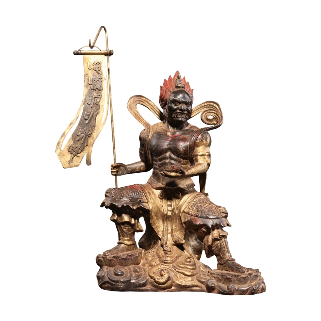 Pure Copper Gilded Vermilion Buddha Statue: This Buddha statue is made of pure copper, with a combination of gilding and vermilion that gives it a solemn and layered appearance. The statue is well-proportioned and heavy, with a dignified