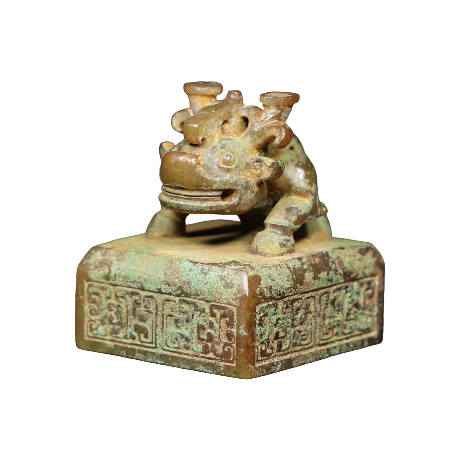Han Dynasty Hetian Jade Beast Knob Seal: This Han Dynasty Hetian jade seal features exquisite craftsmanship and fine jade quality, with an aged patina that reflects the superb ancient techniques. The beast knob design is unique, with meticul