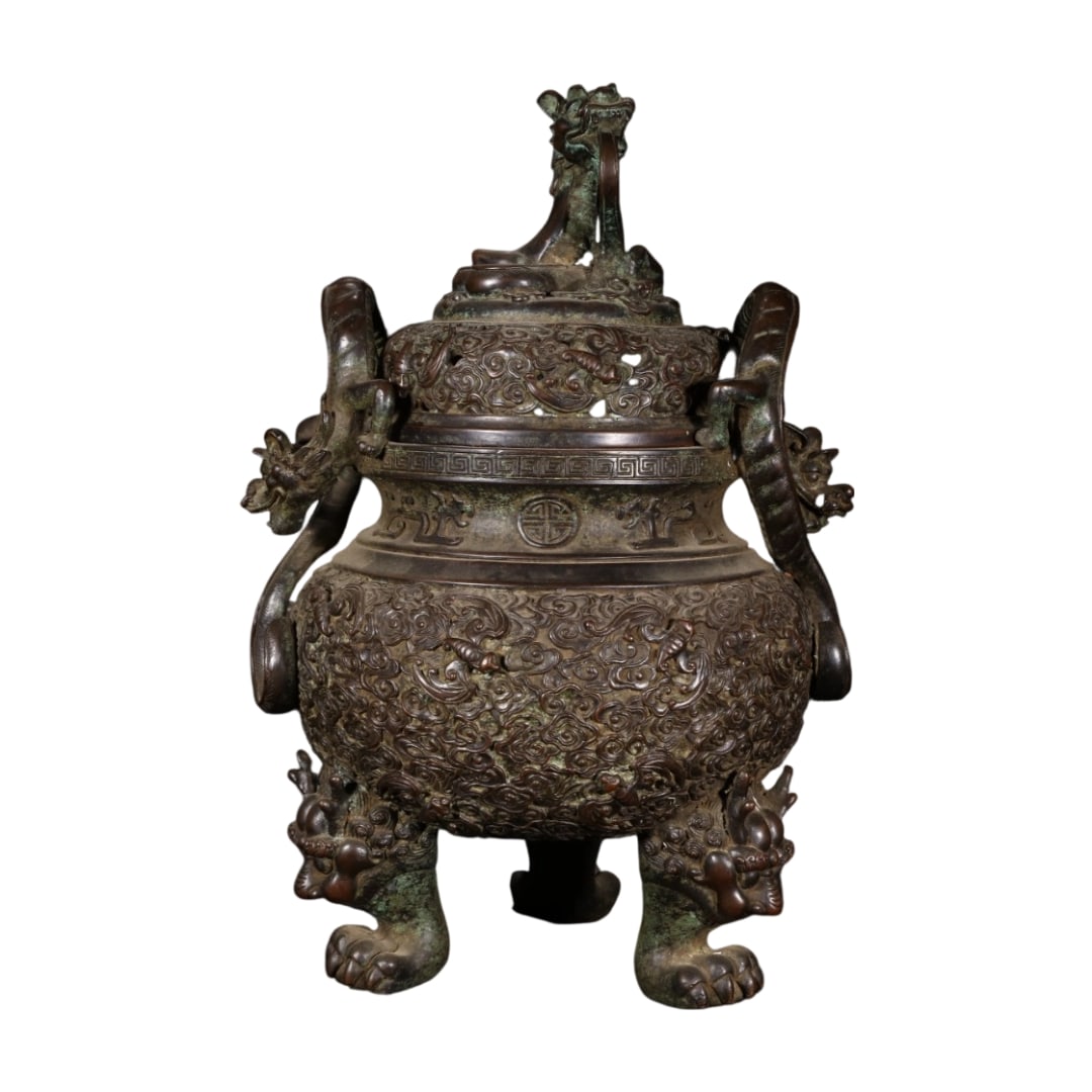 Qianlong Period Purple Copper Incense Burner with Double Dragon Handles and Cloud Bat Design: This incense burner is cast in fine copper, with an ancient and heavy patina covered with natural rust. The lid is intricately carved with cloud patterns, topped with a coiled dragon knob, allowing sm