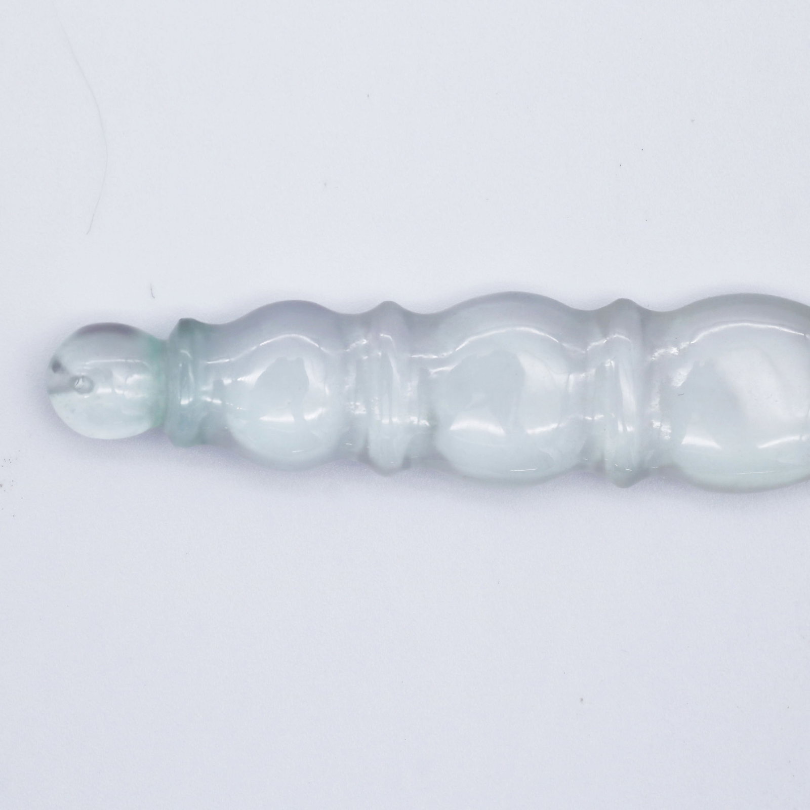Ice Jadeite Ritual Pendant: Ice Jadeite Ritual Pendant Material: Jadeite Dimensions: Width 1.5 cm, Height 6 cm, Weight 8 g