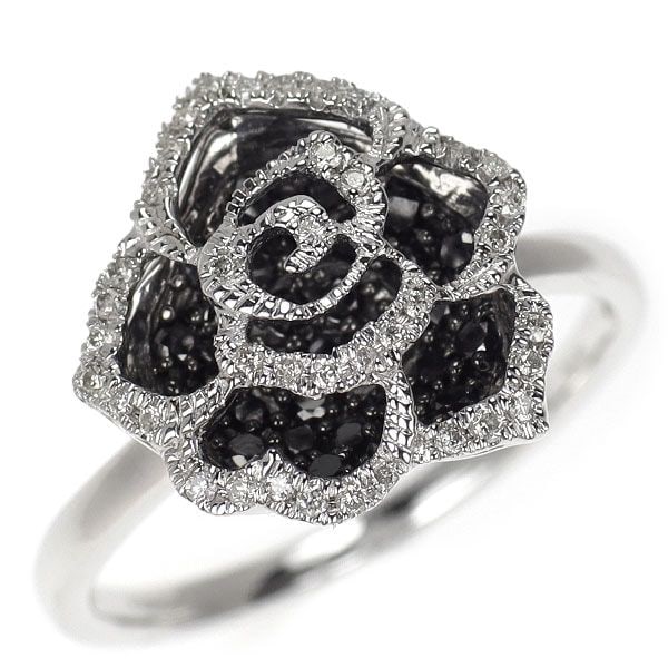 Pre-owned K18WG Colorless/Black Diamond Ring 0.50 Carat Floral Design: This is a platinum ring crafted with two-tone diamonds, designed in an elegant floral pattern reminiscent of a rose. The three-dimensional pattern is luxuriously paved with black diamonds on the base,