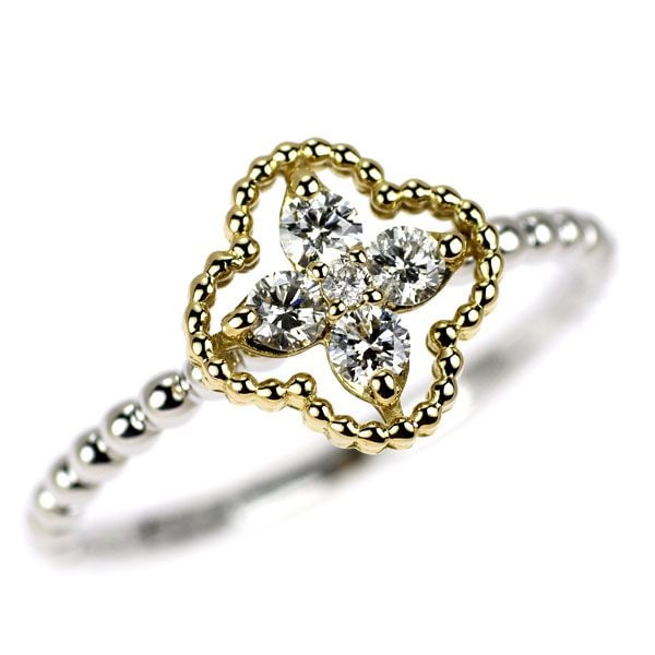Pre-owned K18YG/WG Diamond Ring 0.25 Carat Floral Design: This is an elegant ring featuring five diamonds arranged in a floral shape. It is adorned with delicate and intricate milgrain detailing, presenting a charming design. The band is embellished with rou