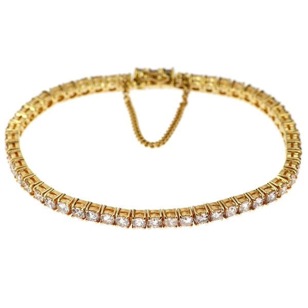 Pre-owned K18YG Diamond Bracelet 6.09 Carats Tennis Style: This is a tennis bracelet set with a total of 6.09 carats of diamonds. Each diamond is meticulously claw-set, forming a circle to create a luxurious piece of jewelry. The delicate and beautiful elegan