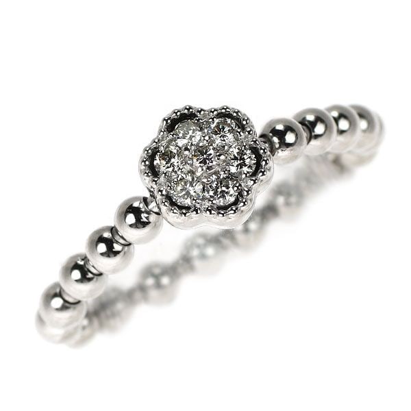 Pre-owned Pt900 Diamond Ring 0.20 Carats Floral Design: A platinum ring with a total of 0.20 carats of diamonds. This piece features a free-size design that allows the ring's band to expand and contract to fit the finger comfortably and lightly. The dazzli
