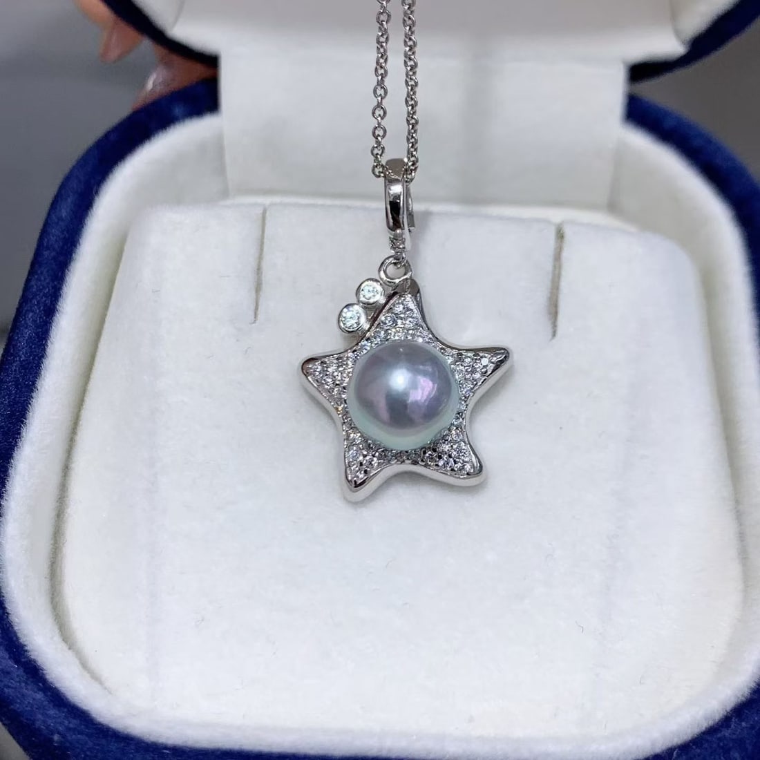 Sterling Silver Flawless Sea Water Pearl Starfish Pendant: This pendant is crafted from sterling silver and features a flawless sea water pearl measuring 7-8mm in a perfect round shape, showcasing an elegant and natural harmony. Each pearl radiates a unique