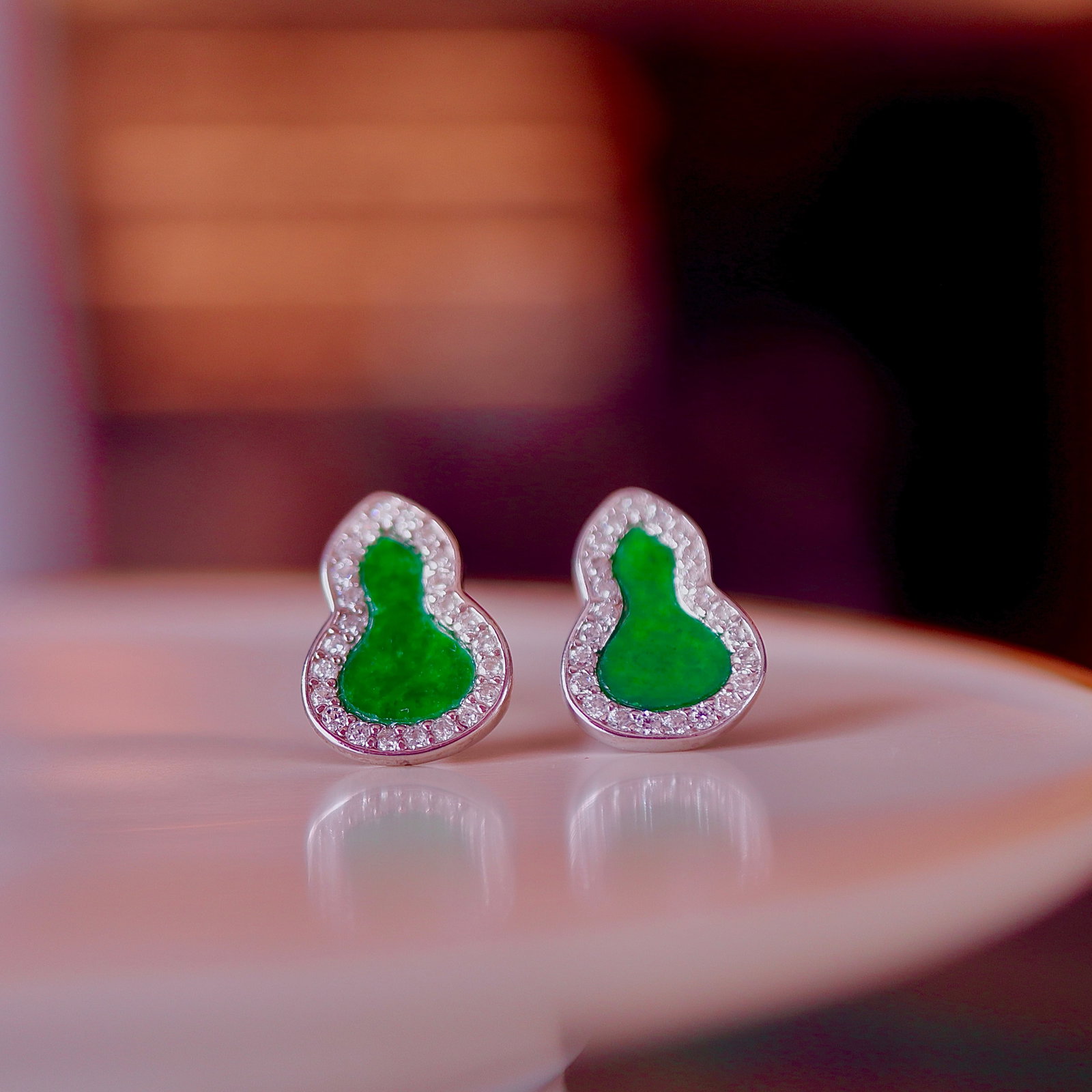Natural Jadeite Full Green Earrings: These earrings feature natural jadeite as the main stone, showcasing a full green hue with dimensions of approximately 7*10mm, set in S925 sterling silver. The beautiful color makes them suitable for 