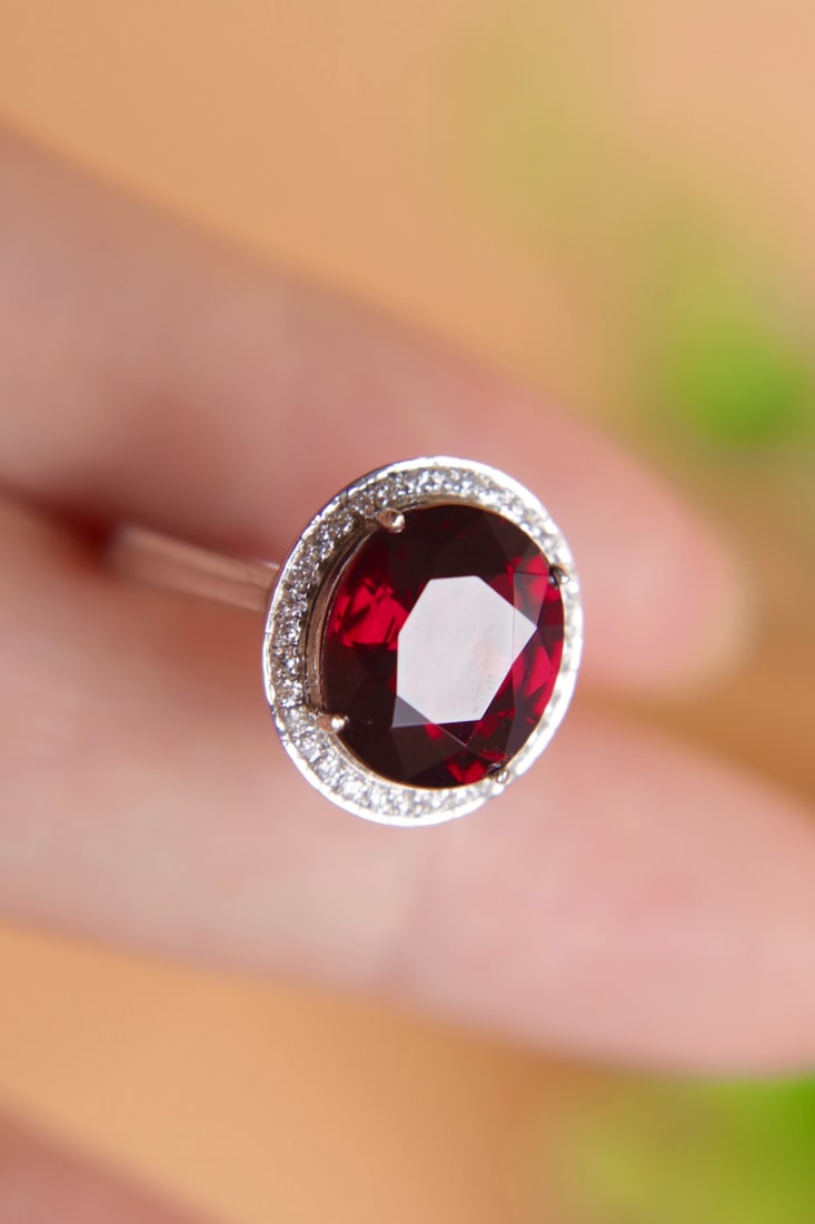 18K Gold Natural Red Tourmaline Garnet Diamond Ring: This ring is meticulously set in 18K gold, featuring a stunning 5.55-carat red tourmaline garnet as the centerpiece, surrounded by dazzling diamonds that showcase unparalleled luxury. (Main stone 5.55