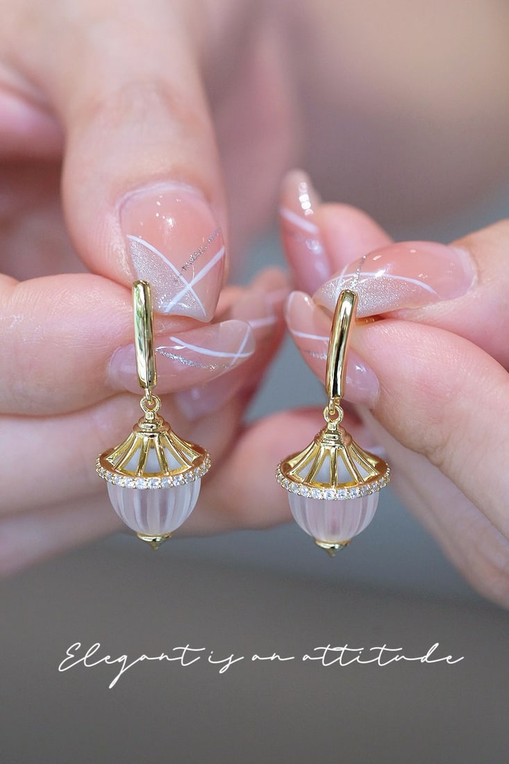Thick Gold Plated Natural White Crystal Earrings: These earrings feature custom-cut frosted white crystals as the main stone, complemented by thick gold plating, showcasing unparalleled texture and elegance. Every detail exudes a luxurious aura, remi