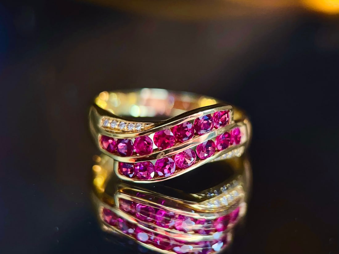 Ruby Ring: This ruby ring showcases a vintage elegance combined with modern style. The deep hue of the ruby complements the brilliance of the diamonds, making it suitable for any occasion. (Weight 2.38g, Main