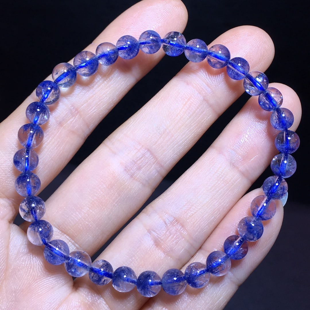 Natural Blue Rutilated Quartz Bracelet: This bracelet is made of rare natural blue rutilated quartz, showcasing a unique blue sheen. Each bead is carefully selected to ensure purity and high quality. Suitable for various occasions, adding a