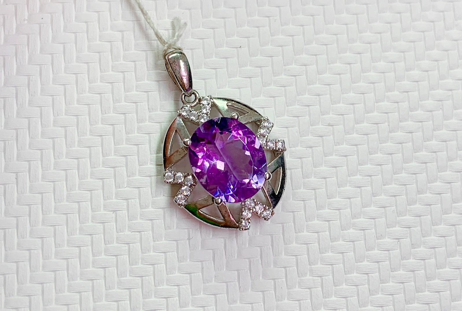925 Silver Natural Amethyst Pendant: This pendant is meticulously set in 925 silver, showcasing the enchanting brilliance of natural amethyst. The amethyst's deep and elegant hue makes it suitable for any occasion. The stone size is 10-8