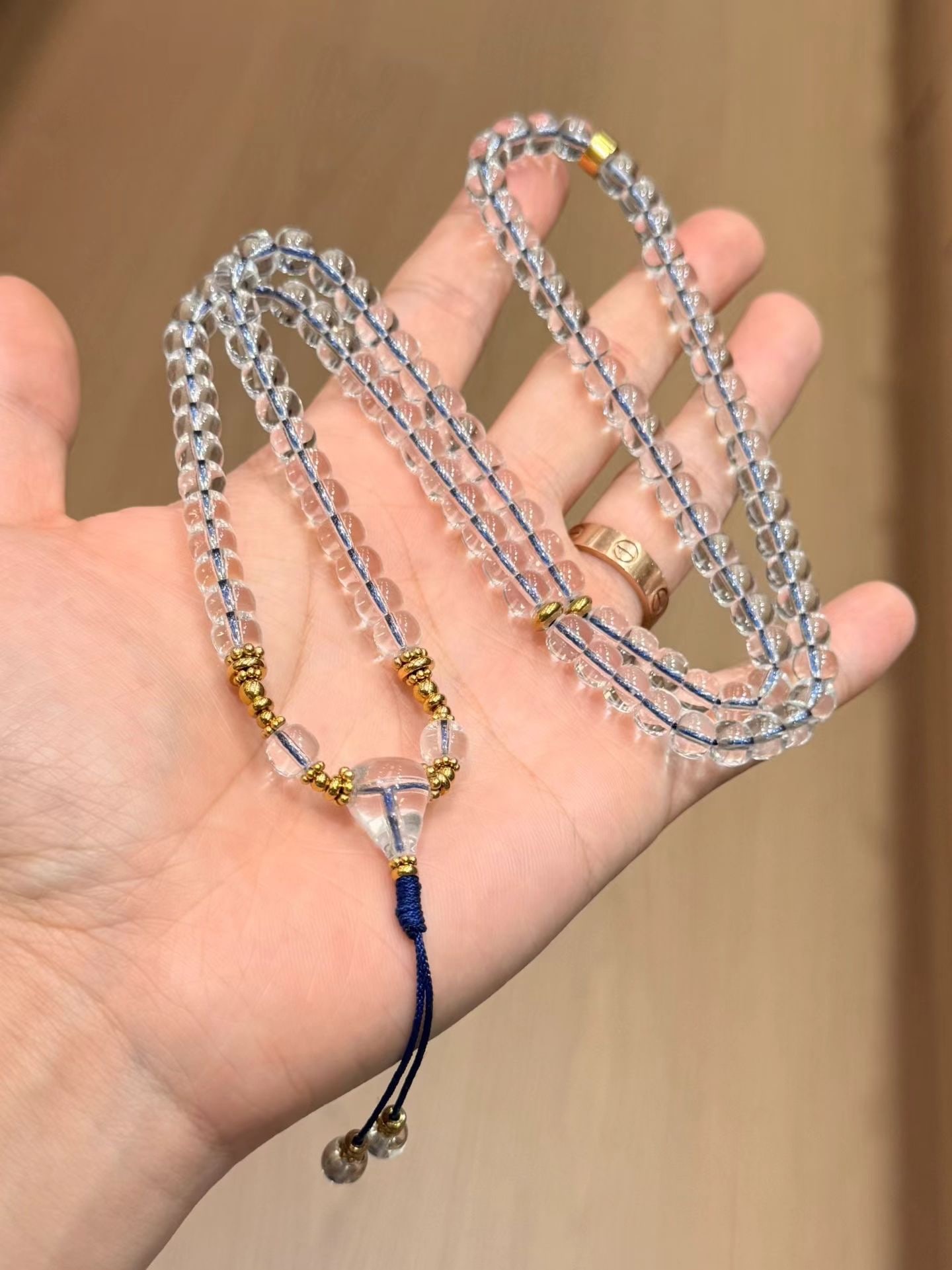 White Crystal Necklace: This necklace features white crystal beads, approximately 6*7mm in diameter, showcasing a natural, translucent beauty.