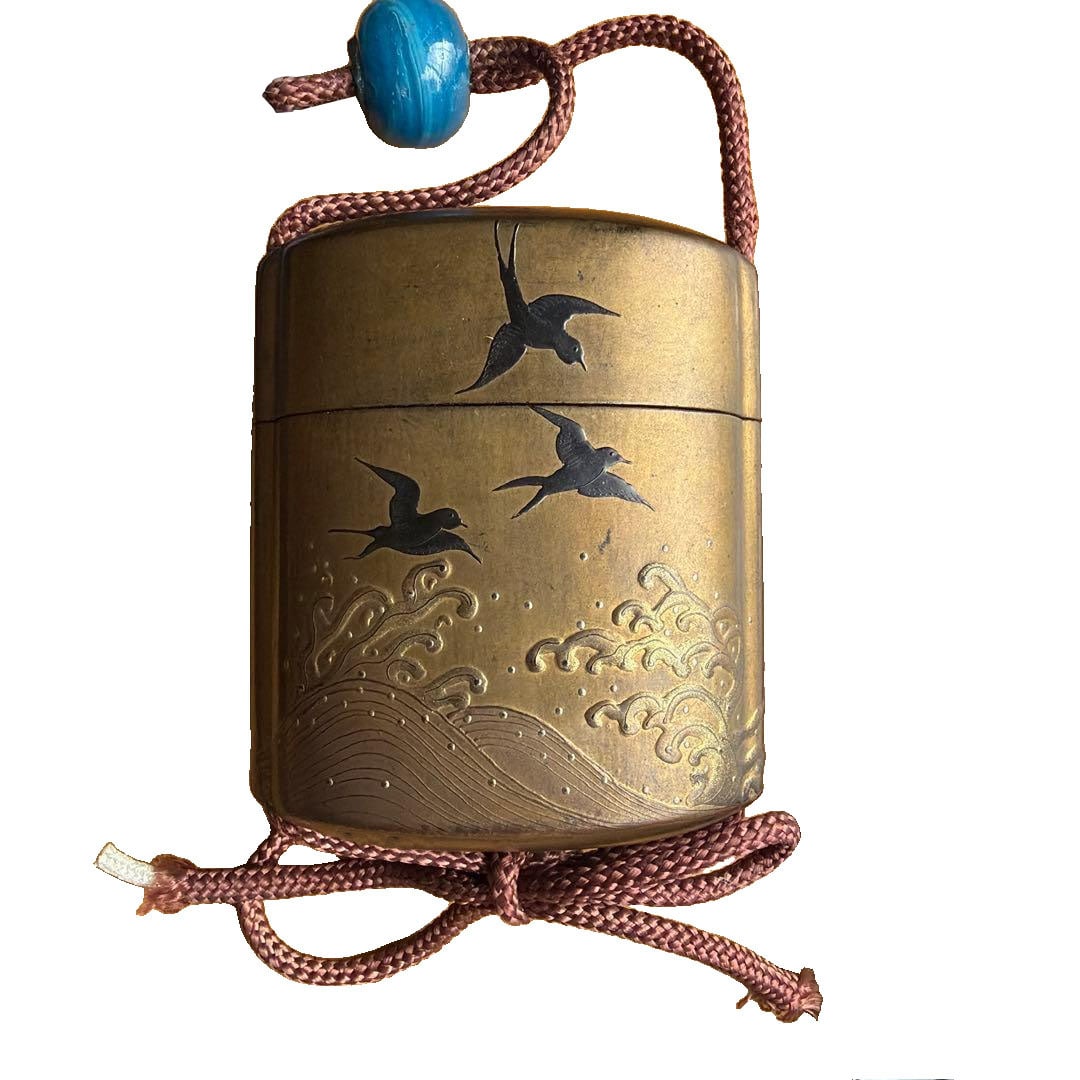 Antique Carving of Swallows and Waves Inro: Antique Item: Swallow and Wave Carved Imitation Sword This is a bronze yatate, intricately carved with patterns of swallows and waves. Some parts are damaged. Category: Inro. Theme: Swallows, Waves.