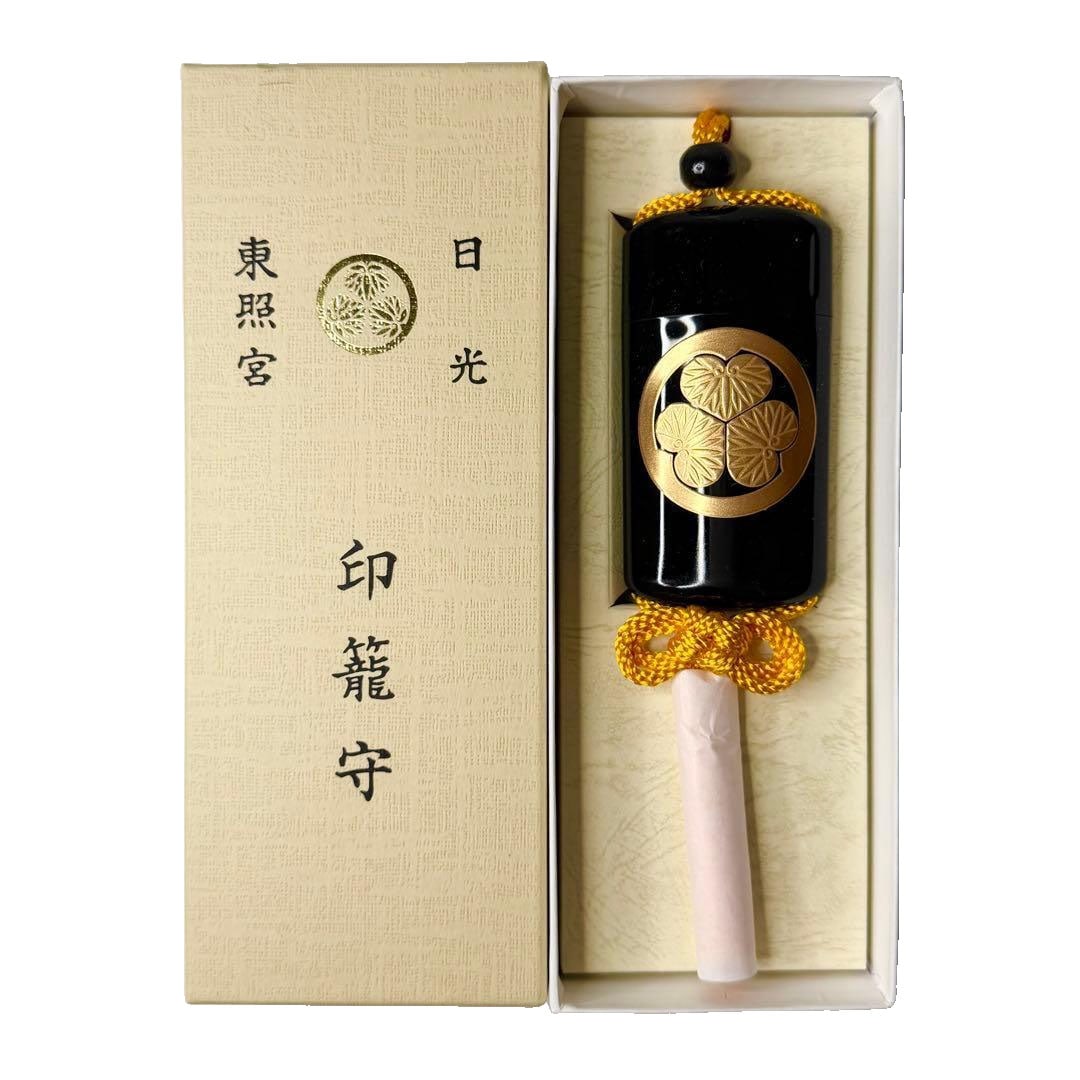 Inro Netsuke: Inro Netsuke This is an inro netsuke from Nikko Tosho-gu. It features the Tokugawa family crest three hollyhock leaves and is designed with a substantial sense of weight. It is unused and preserved