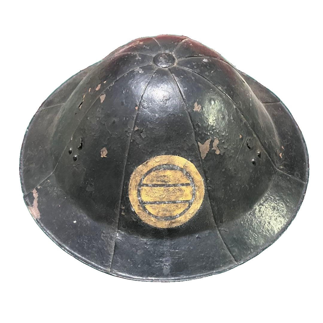 From an old family collection, an ancient jingasa (war hat) featuring two crests, associated with (1 of 7)