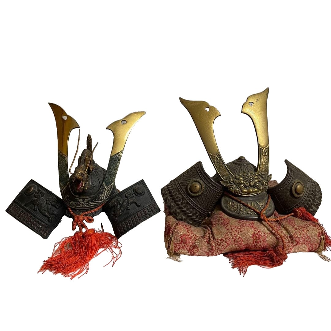 Set of Two Metal Armor Decorations with Lion and Dragon Carvings: Set of Two Metal Armor Decorations with Lion and Dragon Carvings Metal Helmet Decoration, featuring carved designs of lions and dragons. Noticeable stains. Dimensions approximately 25cm in length, 34c