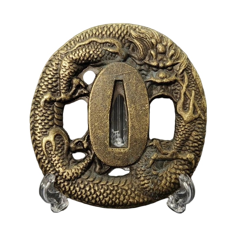 Tsuba with Dragon Motif Alloy Modern Piece Tsuba Sword Guard Japanese Sword Fittings: Tsuba with Dragon Motif, Alloy, Modern Piece Material: Alloy. Weight: Approximately 93 grams. Thickness: Approximately 4 millimeters. The item is only the tsuba; the sword stand is used for photograph