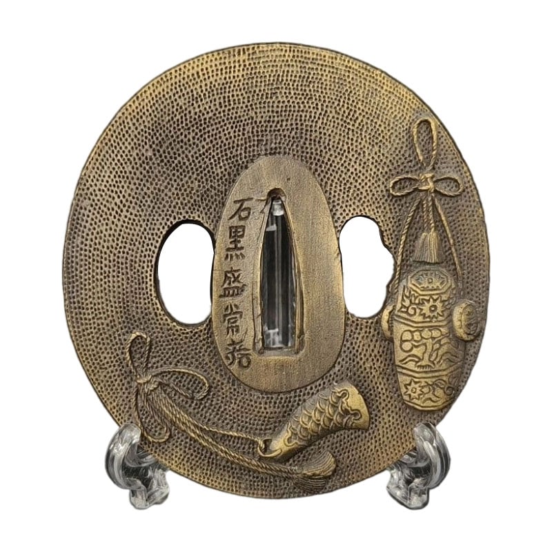 Tsuba with Vase Design, Alloy, Modern Piece. Tsuba, Sword Guard, Japanese Sword Fittings.: Tsuba with Vase Design, Alloy, Modern Piece Material: Alloy. Weight: Approximately 129 grams. Thickness: Approximately 5 millimeters. The item is only the tsuba; the sword stand is used for photograph