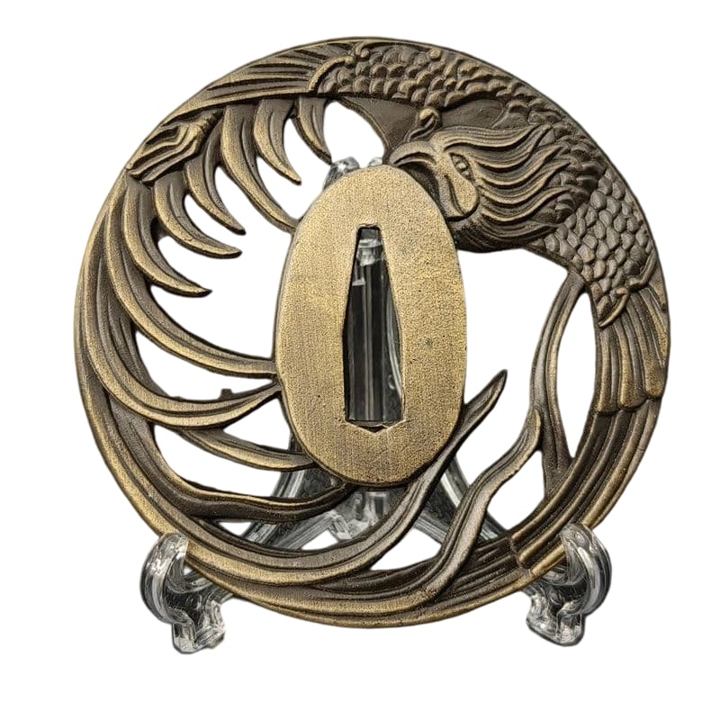 Tsuba with Suzaku Design, Alloy, Modern Piece: Lot GK100: Sword Guard (Tsuba) with Suzaku Design, Alloy, Modern Piece Material: Alloy, Weight: Approximately 102 grams, Thickness: Approximately 5 millimeters. The item is solely the sword guard; the