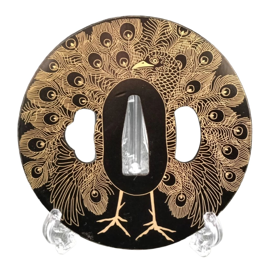 Tsuba with Peacock Design, Iron, Gilt Technique: Tsuba with Peacock Design, Iron, Gilded Technique Material: Iron, approximately 5mm in thickness, weighing approximately 130 grams. The item is solely the tsuba; the sword stand is for photography pur