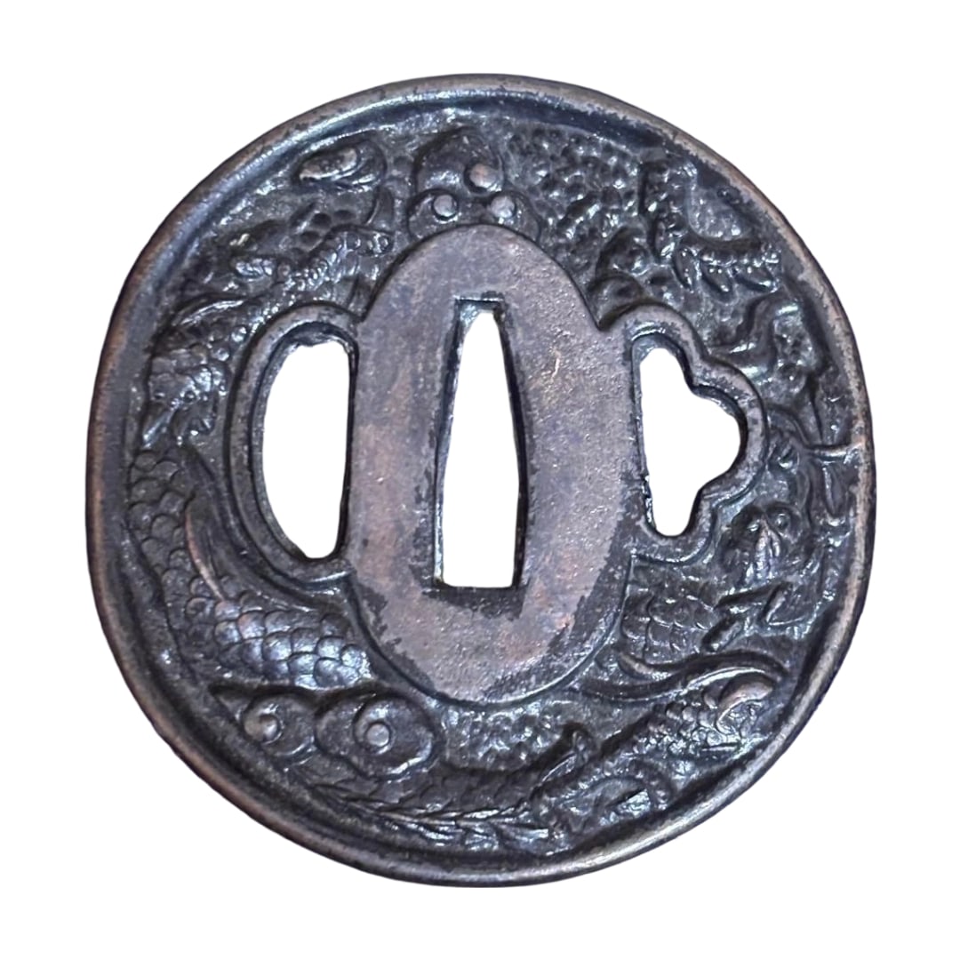 Sword Fittings: Dragon Motif Tsuba, Japanese Sword: Tosogu Ryuzu Tsuba Nihonto This is a circular tsuba with a high-relief design of dragons and clouds, possessing a substantial texture. The motif is a dragon design, circular in shape, and classified