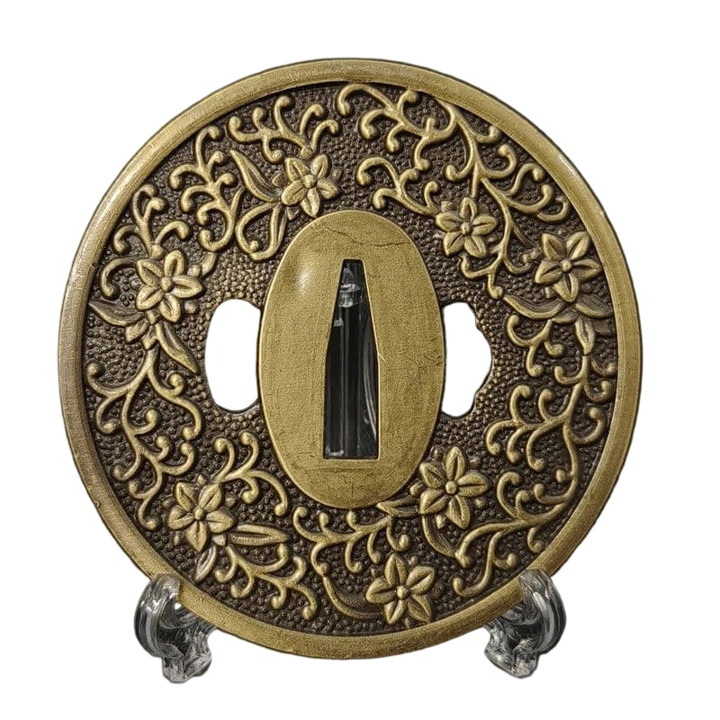 Tsuba with Orchid Design, Alloy, Modern Piece. Tsuba, Sword Guard, Japanese Sword Fittings.: Tsuba with Orchid Design, Alloy, Modern Piece Material: Alloy. Weight: Approximately 119 grams. Thickness: Approximately 5 millimeters. The item is only the tsuba; the sword stand is for photography