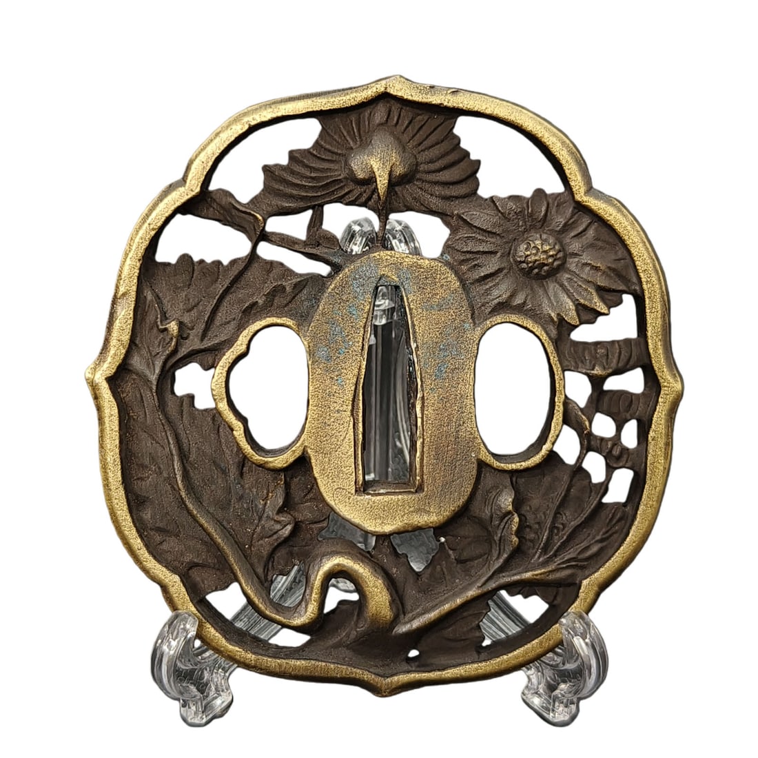 Tsuba with Chrysanthemum Design, Alloy, Craftsmanship: Tsuba with Chrysanthemum Design, Alloy Material: Alloy. Thickness: Approximately 6 millimeters. Weight: Approximately 104 grams. The item is the tsuba only, and does not include a tsuba stand. The ite
